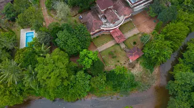 an overhead view of a house in a forest at Misty Heights by The Sanihara in Vayittiri