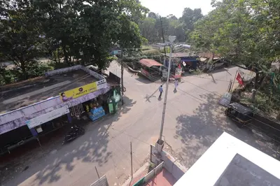an overhead view of a city street with a building at New star homes in Kotamangalam