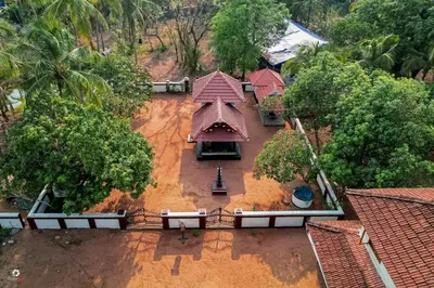 an aerial view of a house with a roof at Meleppura Heritage Homestay in Chāvakkād