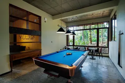 a billiard room with a pool table in it at Willow Resorts Wayanad in Ambalavayal