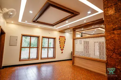 a large room with a door and windows at Vasthyam in Kenichira
