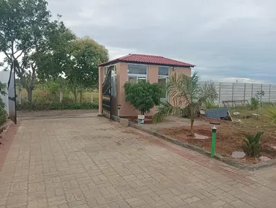 a small house with a walkway in front of it at ANTARA STAY in Coimbatore