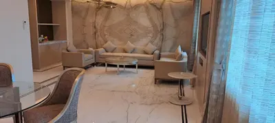 a living room with a couch and a table at Fortune Park, Tiruppur - Member ITC Hotels' Group in Tiruppūr