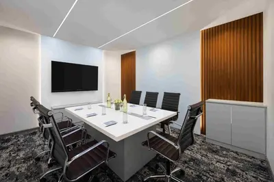 a conference room with a table and chairs at Fortune Park, Tiruppur - Member ITC Hotels' Group in Tiruppūr