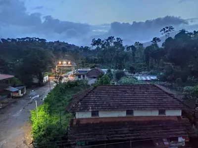 a view of a village with a house and a street at Paadi Inn in Kakkabe