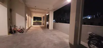 an empty hallway of a house at night at ELITE RESIDENCY in Palani