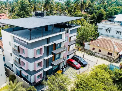 an overhead view of a building with a parking lot at Shams al Imarat in Palakkad