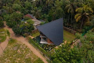 an overhead view of a house with a black roof at Bimal's Casa de Papel in Kadikkād