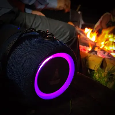 a purple light on a bag in front of a fire at Cloud & Mist Inn-Whole Villa Stay with Mountain Views in Kotagiri, Near Ooty in Kotagiri