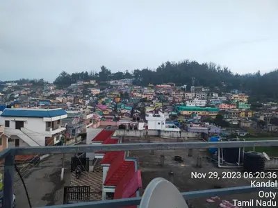 a view of a city with buildings at J J HOMES in Ooty