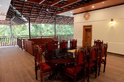 a dining room with a table and chairs at Best Heritage Home in Iritti