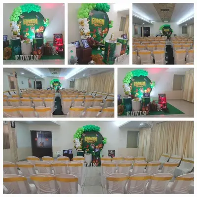 a group of four pictures of a hall with chairs at Hotel Sapthagiri Nest in Coimbatore