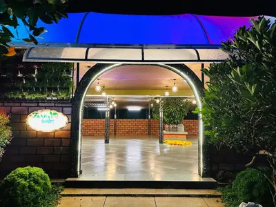 an entrance to a building with an archway at Farm Fort Resort in Kozhikode