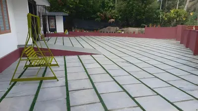 a yellow ladder on the floor of a patio at Souparnika Lakeview Homestay LLP in Wayanad