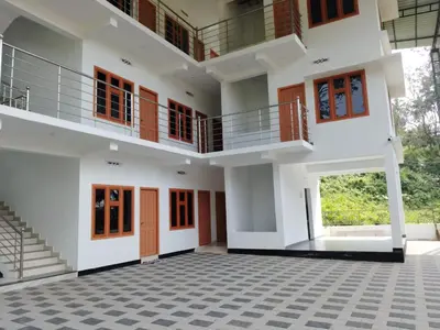 a view of the front of a house at GREEN FIELDS Apartments in Mananthavady