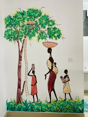 a wall mural of people with a tree at Queen C Inn Wayanad in Mānantoddy