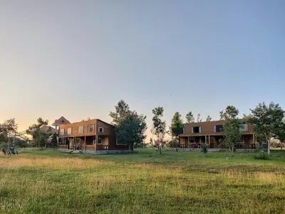 a house in the middle of a field at labdhi Resorts Masinagudi- Stag Groups not allowed in Masinagudi