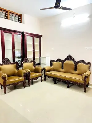 a room with three couches and a ceiling at Guruvayur Homestay - 2 AC Bedrooms, Hall & Veranda in Guruvāyūr