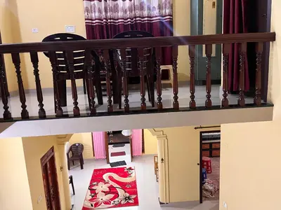 an overhead view of a staircase in a house at Manasam Homes Near To IIM & NIT - kOZHIKODE in Kunnamangalam