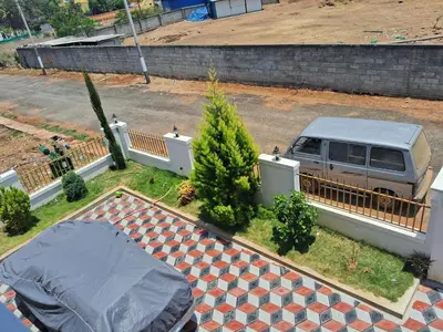 an aerial view of a van parked in a driveway at Royal homes a2 in Kushālnagar