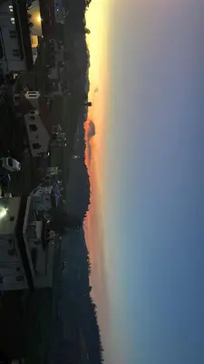an aerial view of a river at sunset at Amarah Homestay in Ooty