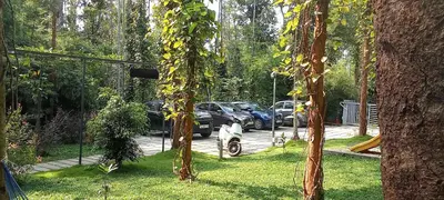 a group of cars parked in a parking lot at Le Vista Resort in Sultan Bathery