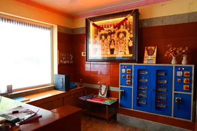 an office with a framed picture on the wall at KG Grand Inn in Erode