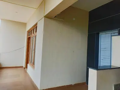 an empty room with a window and a wall at 2BHK Flat by SR Renton Comfort Homestay Mysore @ Vijayanagar 2nd stage Mysore in Mysore