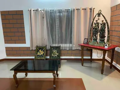 a room with a table and chairs and a window at 'Vrindavan' in Heritage City Mysuru in Mysore