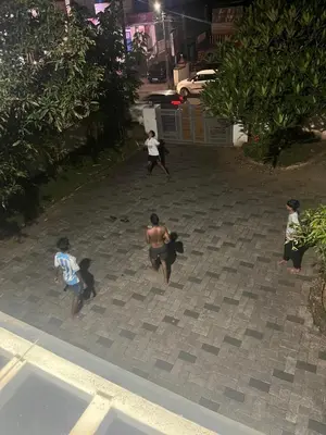 a group of people playing a game of frisbee at THEStay in Alwaye