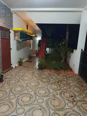 a hallway of a house with a spiral tile floor at S R Luxurious Fully Ac 3 BHK Bunglow Mysore in Mysore