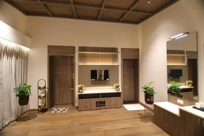 a bathroom with two sinks and a large mirror at Cataleya in Kotagiri