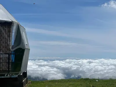 a view of the clouds from the top of a mountain at Kodaikanal Luxuries Glamp - Krishna Paradize in Kūkkāl