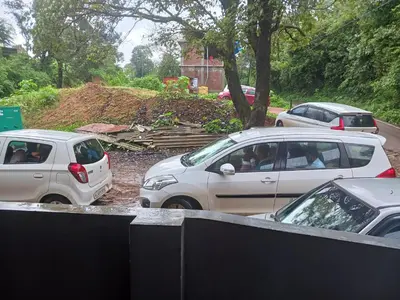 a group of cars parked in a parking lot at Coorg Sunway home stay in Madikeri