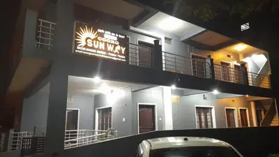 a building with a sign that reads sunshine sun way at Coorg Sunway home stay in Madikeri