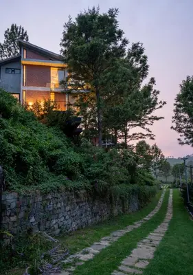 a stone path in front of a house at LohonoStays Villa Amani 8A in Coonoor