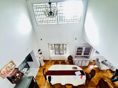an overhead view of a room with a table and chairs at Teyt's White Home - 3 bedroom Villa in Ooty