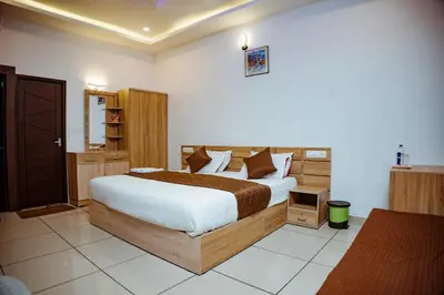 a bedroom with a large bed in a room at Wildside Wayanad in Wayanad