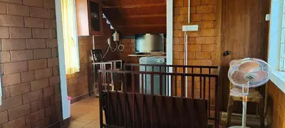 a hallway of a house with a fan in it at Gangadharam Tiny House 2BHK AC in Tellicherry