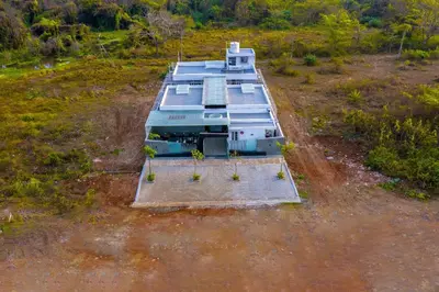 an aerial view of a boat in a field at S R Luxury Stays in Mysore