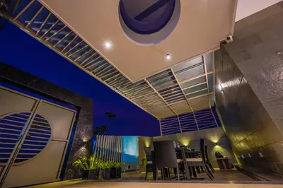 a room with a ceiling with blinds on it at S R Spa Suites in Mysore