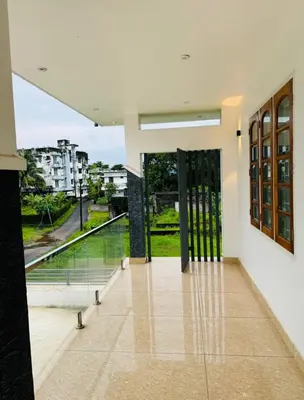 a room with a view of a building at Diamond Villa Near Rajagiri Hospital in Alwaye