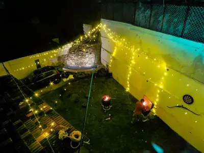 an overhead view of a building with lights on it at Abbu Royal Palace Cottage in Ooty