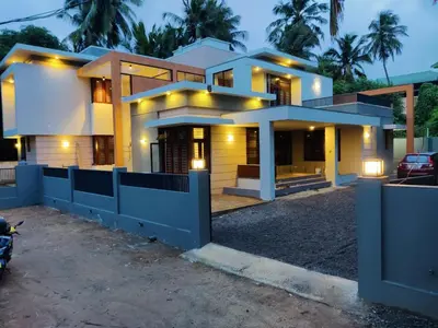a house with a gate in front of it at Sannidhi Homes Palakkad in Palakkad