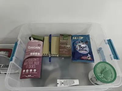 a drawer with some food and other items in it at 7 Elysee Homestay - Lapis - Premium 3BHK Family Flat in Trichūr
