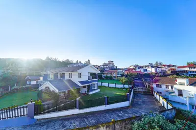 arial view of a residential neighborhood with houses at Via Bala Garden in Ooty