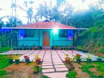 a small house with a pathway in front of it at ADVI'S homestay in Agali