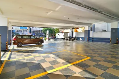 a car parked inside of a parking garage at Eka Lyf Inn in Coimbatore