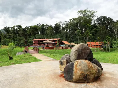 a pile of rocks sitting on top of a road at Villa Katipadu Coorg in Srimangala