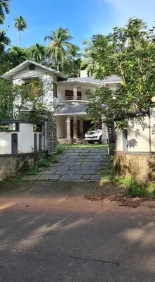 an old house with a parking lot in front of it at 3 BHK HOUSE with nice facilities,Gate&Fence in Kunnamangalam